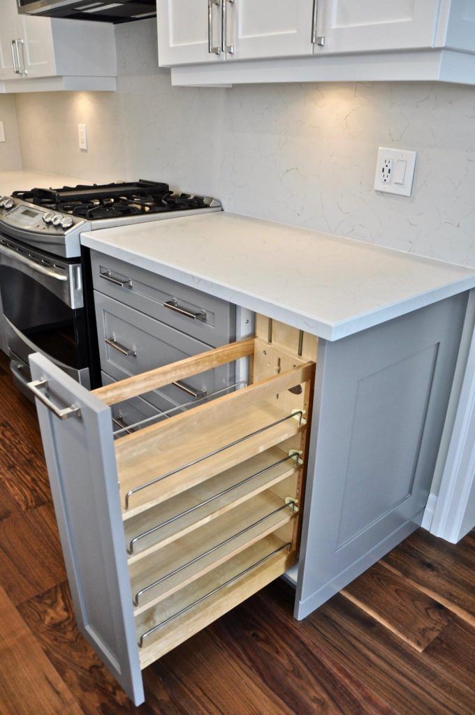 a kitchen cabinet drawer pulled open