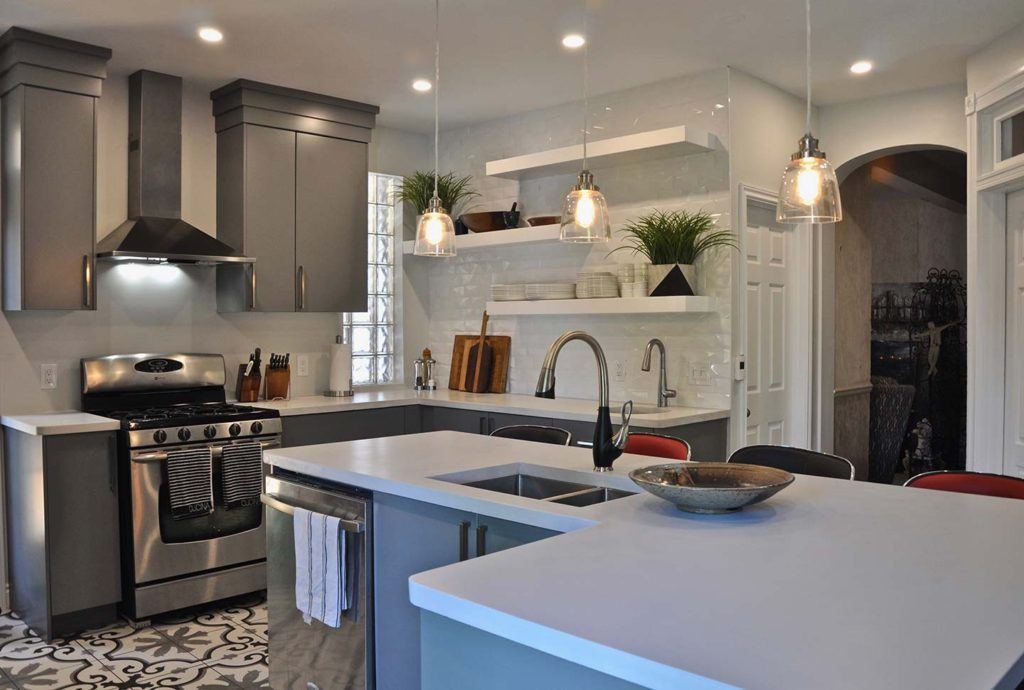 remodelled kitchen with white countertops and grey cabinetry