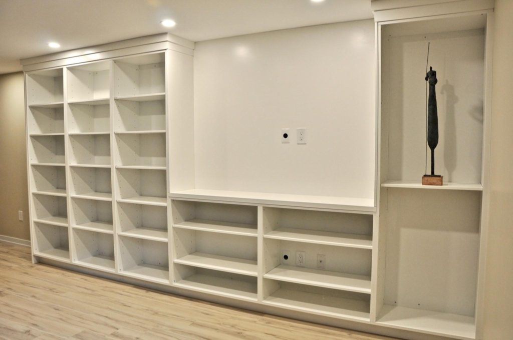 empty white shelving until on a wall